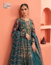 Mark your presence in this elegant Mehndi outfit. The front open scalloped pishwas in the teal green shade are adorned with hand-crafted details of tilla, dabka, Kora, Kundan and the real magic of Zardozi. It is further enhanced with golden embroidery to give a royal touch to this outstanding pishwas. The floral matters on full sleeves enhance the beauty of the outfit. In addition to this, the round neckline style of the following pishwas is absolutely breathtaking. It is paired with crushed lehenga n the same colour to enable the fairness of the outfit. Complete this stunning dress with a dupatta framed with a four-sided border to highlight your presence.