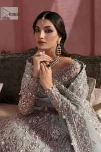 A timelessly classic and hot Nikah wear. DeemasFashion presents the flared maxi in grey colour which is heavily adorned with silver embroidery which is prominent with tilla, dabka, Kora, Kundan and the details of crystals. The boat shape neckline gives a super glamorous touch to the outfit. in addition to this, the floral patterns on full sleeves make this article lovely and romantic. A perfect outfit for an everlasting majestic look is paired up with a dupatta in the same colour framed with four-sided embellished borders and tiny floral motifs all over to give it a perfect royal look.