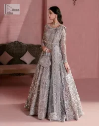 A timelessly classic and hot Nikah wear. DeemasFashion presents the flared maxi in grey colour which is heavily adorned with silver embroidery which is prominent with tilla, dabka, Kora, Kundan and the details of crystals. The boat shape neckline gives a super glamorous touch to the outfit. in addition to this, the floral patterns on full sleeves make this article lovely and romantic. A perfect outfit for an everlasting majestic look is paired up with a dupatta in the same colour framed with four-sided embellished borders and tiny floral motifs all over to give it a perfect royal look.