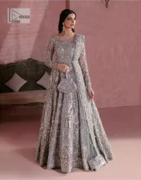 A timelessly classic and hot Nikah wear. DeemasFashion presents the flared maxi in grey colour which is heavily adorned with silver embroidery which is prominent with tilla, dabka, Kora, Kundan and the details of crystals. The boat shape neckline gives a super glamorous touch to the outfit. in addition to this, the floral patterns on full sleeves make this article lovely and romantic. A perfect outfit for an everlasting majestic look is paired up with a dupatta in the same colour framed with four-sided embellished borders and tiny floral motifs all over to give it a perfect royal look.