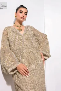 A little classy, a little sassy – that’s your style! An ivory floor-length kaftan with hand embellished work using dabka, naqshi, cut dana, Resham,  Mukesh, sequin and Kundan.  The beauty of this bridal lies in the geometric pattern of light golden embroidery. The V shape neckline is the finishing royal touch. Further, the floral motifs on full sleeves make this nikah outfit romantic and charming.  By layering this item, you can make any simple event better.