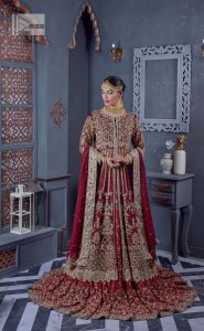 Bold and classy colour for the reception outfit! The maroon gown is breathtakingly adorned with hand-crafted embellishments and intricate designs. It is enhanced with tilla, dabka, Koran, Kundan and details of Zardozi. The round neckline is emblazoned with golden embroidery to make this masterpiece romantic. The full sleeves of the following scalloped gown are adorned with fine details. It is paired with flared lehenga which is also heavily embellished giving a royal look to the gorgeous bride. Finish this maroon outfit with a dupatta which is ornamented with four-sided borders and sequins sprayed all over to create an exquisite dress.