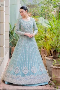 Introducing our stunning sky-blue Walima outfit, a masterpiece of artistry and elegance.