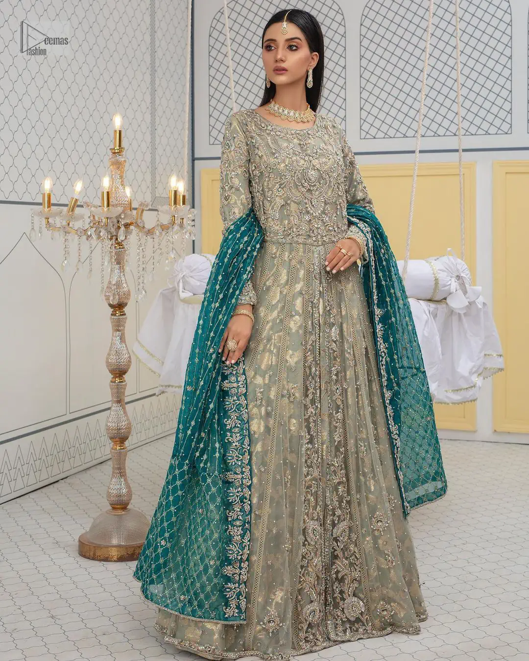 Embellishment is on the rise! The elegant front open maxi is heavily embellished in work of tilla, sequins, dabka, Zardozi,