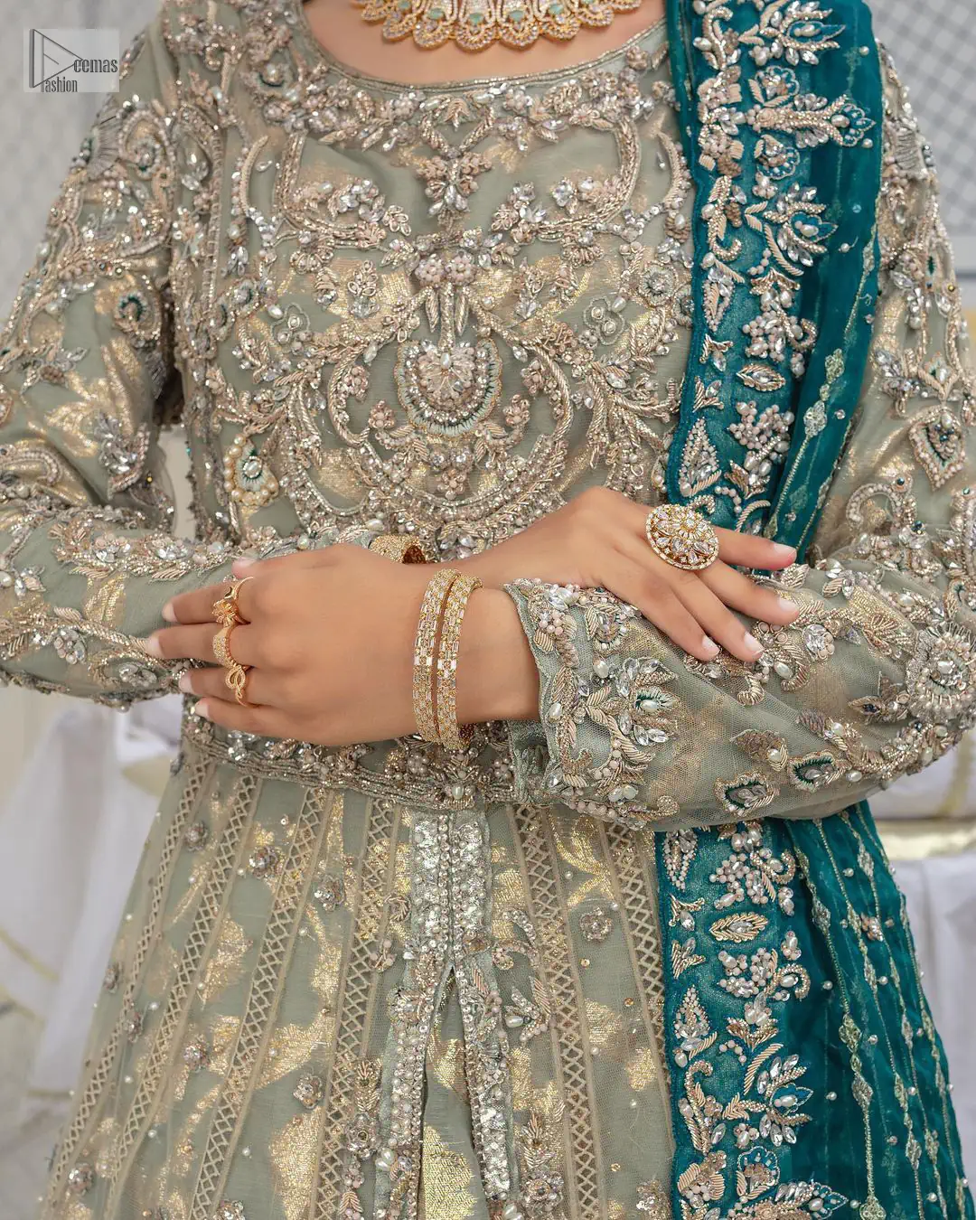 Embellishment is on the rise! The elegant front open maxi is heavily embellished in work of tilla, sequins, dabka, Zardozi,