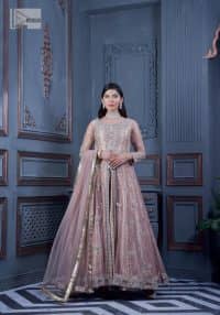 Have style and warmth with this tea rose nikah outfit! The front open maxi is the magic of floral motifs with engaging embellishments on the jamawar fabric, making this an eye-catching ensemble. The following maxi is adorned with tilla, dabka, Kora, Kundan and the real magic of Zardozi. The timeless silhouette is crafted, with floral motifs. The silver embellishments give a glamorous touch to this exquisite attire. In addition to this, the full sleeves are also decorated with floral motifs to make this article bright and charming. The round neckline also adds beauty to the overall look. Finish this article with a dupatta adorned with a four-sided borders and sequins sprayed all over for a perfect and classy look.