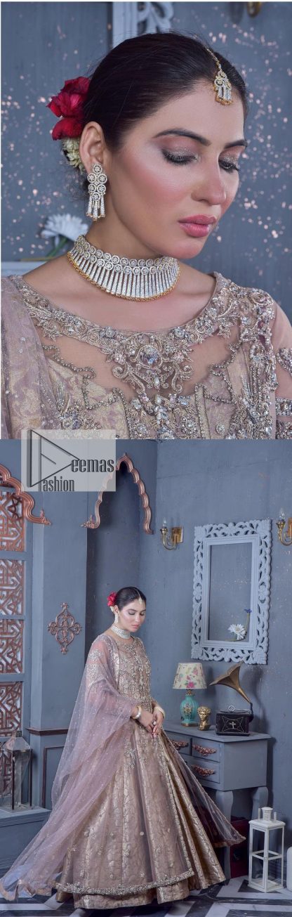 Create warm memories with this super soft and enticing tea rose nikah outfit. The vibrant shade of this maxi makes it an alluring choice for the bride. Hand-crafted adornments and designs which involve tilla, dabka, kora, Kundan and Zardozi make this attire an epitome of beauty and royalty. The round neckline of the following maxi is enhanced with silver and golden embroidery. Further, the sleeves are adorned with floral motifs to highlight the charms. The elaborately detailed border and sequin spray on the organza dupatta makes the costume ideal for your bug day.