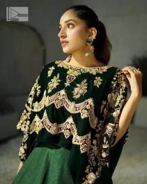 Style. Warmth. Performance & versatility!  This stuns in a beautifully handcrafted green top enshrined with light golden embellishment and detailed