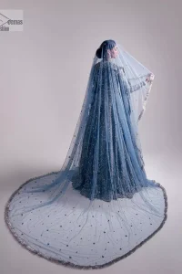 Stay blue and look your best! A sky blue lehenga choli is hand embellished with floral patterns and botanical motifs. The blouse is encrusted with silver embroidery which is enhanced with tilla, dabka, kora, Kundan and the real magic of Zardozi. The jewel neckline and full sleeves make this masterpiece lovely and charming. It is paired up with a lehenga in the same colour that has embellished on the front and back finish. Complete the walima wear with a dupatta having four-sided Kiran and tiny floral motifs all over just to complete the look.