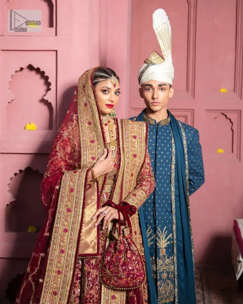 Deep shades of this reception wear just to brighten up your days. The deep red frock is intricately emblazoned with