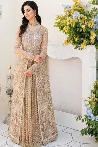 Ultra feminine look in an enthralling shade of brown for an aesthetically pleasing style statement. The beautiful light brown front open scalloped maxi with a medley of hand-embellished floral motifs of silver colour is intensified with tilla, dabka, Kora, Kundan and details of Zardozi. The neckline has an embellished V shape to add elegance and sophistication. Further, the full sleeve style of the following maxi enhances the charms. It is paired with a flared lehenga to complete the view of the nikah article. A frilled net dupatta is finished to complete a gorgeous outfit.