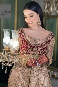 Your words about your special day is expertly written in this beautiful dress. This ivory front open gown is the picture of elegance and majesty. Silver dabka, pearls, tilla, kora, Kundan, zardozi, and the true magic of beads are used to embellish the stunning garment. Golden embroidery on it makes it stand out. The V-shaped neckline of the dress elevates this ensemble. Moreover, full sleeves are embellished with the lovely embroidery. Pairing the richly embroidered ivory gown with a set of simple frilled lehenga and inner frock would look stunning. To achieve professional magic, it is set up with a dupatta that is bordered with four-sided borders and spray of sequins all over.