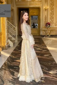 Bringing in the Nikah spirit with some flowers. Exquisite nikkah long shirt dress in pale green colour with silver pearl, sequin, kora, dabka, tilla, Zardozi, and Kundan embroidery accents. The embroidery on the whole length of the sleeves is done in flowery designs. This masterpiece is extremely special and endearing because of the boat shape neckline. The inner blouse of the beautiful outfit is embellished with embroidery. Also, the trousers makes it a wonderful match for the dupatta. In order to balance the entire ensemble, it is arranged with a dupatta.