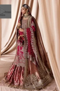 The maroon color is the perfect feminine and delicate shade with its meticulously crafted untruth The gorgeous shirt is embellished with tilla, dabka, kora, Kundan, and Zardozi. The colour of the embroidery is gold. Everyone is captivated by the shirt’s boat shape neckline. Moreover, the shirt’s three quarter sleeves are embellished with floral designs. It is coordinated with scalloped lehenga having beautiful border embellished. Complete this outfit with dupatta framed with a four sided embellished scalloped borders