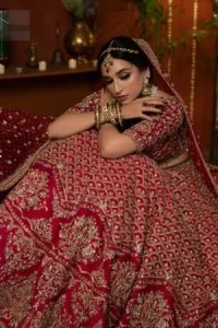 Stand out at your reception in a very special maroon outfit.