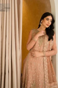 Crafted with utmost precision, this Nikah dress is a blend of tradition and elegance, perfect for your sacred union. Its intricate detailing and delicate embroidery which involves tilla, dabka, kora and Kundan showcase the essence of timeless beauty, enhancing the radiance of the bride.