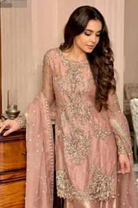 Introducing our Salmon pink Nikah dress, a true embodiment of purity and simplicity for your special ceremony.