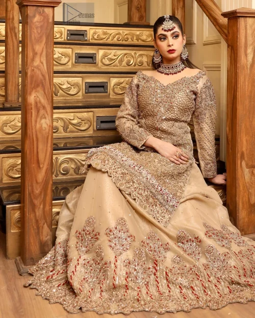 The scalloped hemline adds a playful, romantic touch, while the organza fabric enhances the overall ethereal feel of the outfit.