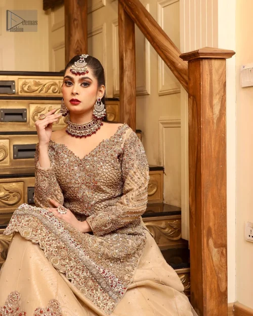 This timeless creation effortlessly blends traditional charm with modern sophistication, making you feel like the essence of bridal elegance.