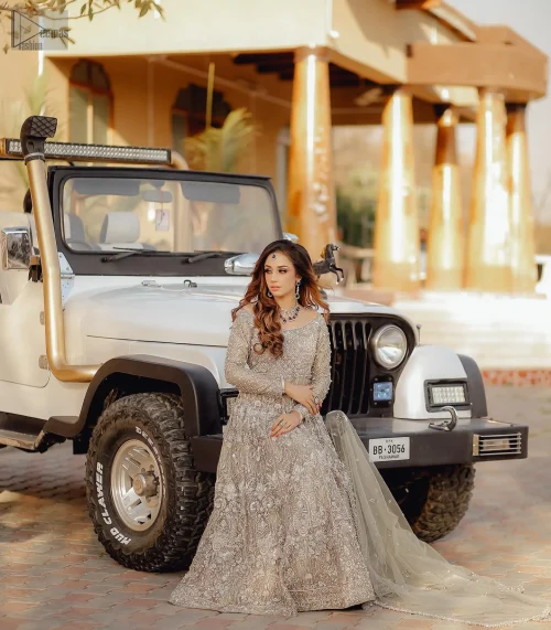 The flowing maxi cascades down, complete with a dreamy backtrain that trails gracefully behind you.