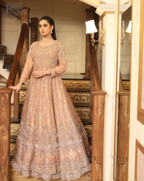 The voluminous Can-Can layers of the lehenga sway with every step, creating a dreamy, flowing effect.