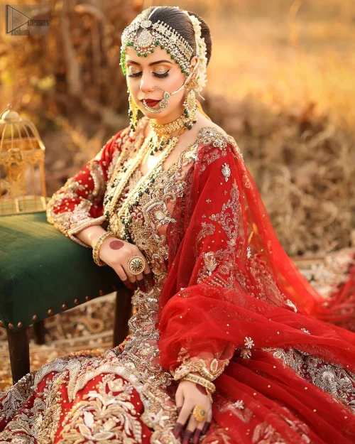 The scalloped dupatta drapes beautifully, completing the look with a hint of playful romance.