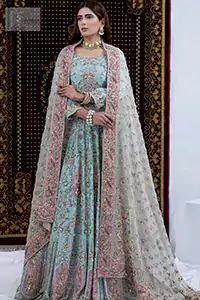 Radiate elegance in this serene dress, a breathtaking creation for the Nikah bride. The soft Aqua hue pairs beautifully with the Ivory accents, creating a stunning contrast.