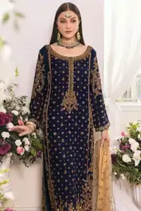 Full sleeves and delicate embroidery anchor this understated outfit, where modern flow meets refined detail.