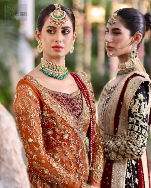 The angrakha, spun in banarsi chiffon, glows under sculptured golden embroidery that moves like sunlight over silk.