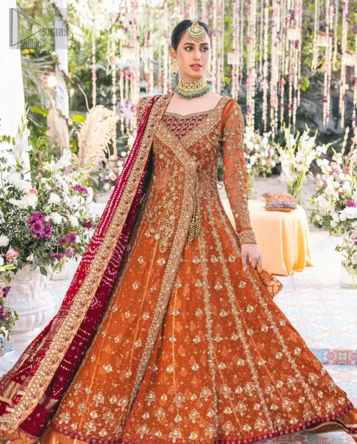 Rust and red entwine like fire and devotion. That’s why the Rust Angrakha Farshi Lehenga radiates majesty meant for the