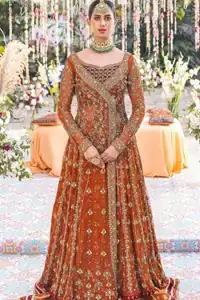 Rust and red entwine like fire and devotion. That’s why the Rust Angrakha Farshi Lehenga radiates majesty meant for the most spirited celebrations.