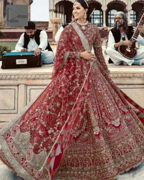 Make your day bright and bold! Deemas Fashion presents a beautiful red outfit which involves silver embroidery and is covered